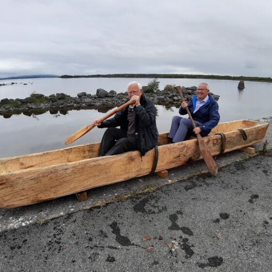 Ben McPoland and Walter McDonagh from Moycullen with Lee's Island 5 replica log boat | Moycullen Heritage