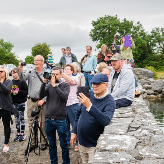 Capturing the launch of the replica Lee's Island 5 Log Boat at Knockferry Pier | MyOptix