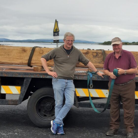Dr Paul Naessens and John Barrett deliver the boat to Knockferry Pier | Moycullen Heritage
