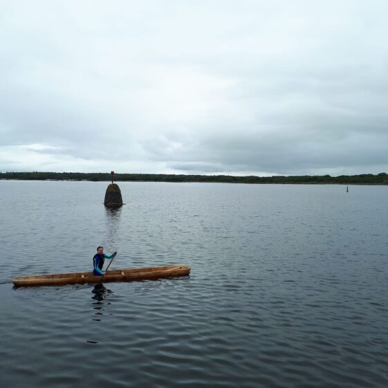 Eilis Eilis tests out the Lees Island 5 replica logboat | Hazel Morrison