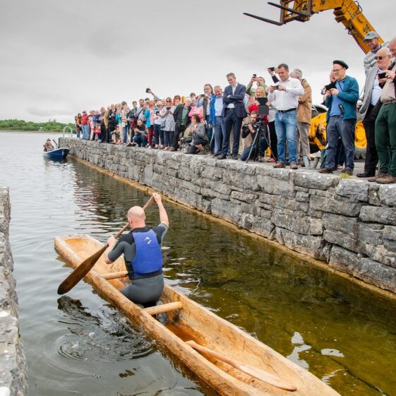 Kevin Cunningham tests the replica Lee's Island 5 Log Boat at Knockferry Pier | MyOptix