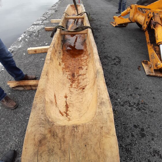 The Lee's Island 5 replica log boat pierside ready for launch | Moycullen Heritage