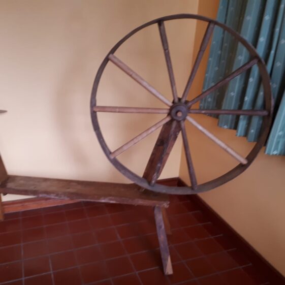 Spinning Wheel believed to have belonged to Nora Egan Thumnasragh.  Tim Griffin has a living memory of his mother Catherine Bohan and grandmother Mary Bohan (nee Walsh) using this spinning wheel. | Photo Courtesy of Tim Griffin