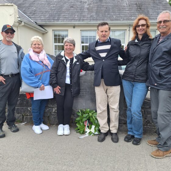 20240523_174335 Grandchildren of Edward O'Malley of Ballinahallia (Ed and Kathy) visit from Maryland with their spouses, meet their cousins, and lay a wreath at Moycullen's Commemoration Stone in memory of their granduncle Thomas O'Malley Killed in WW1. Larry Kilby, Pauline McDonagh, Kathy O'Malley Kilby, Charlie O'Malley, Eva O'Malley, Edward O'Malley. 23 May 2024 | Moycullen Heritage