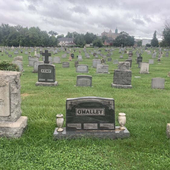 Grave of Thomas O’Malley with his brother and sister-in-law  at New Cathedral Cemetery, Baltimore, Section KK/Lot 189/Grave 3
 | www.findagrave.com
