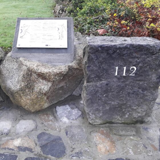 Replica milemarker #112 situate at An Fuarán, Maigh Cuilinn