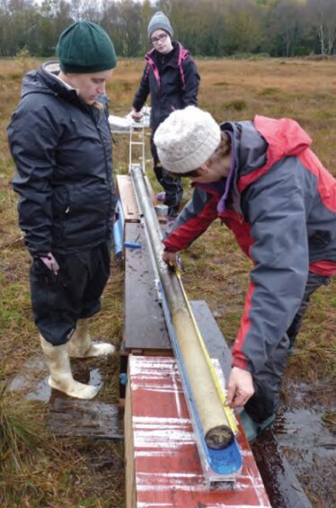 White lake sediment from beneath the bog being measured by Dr Karen Molloy | University of Galway