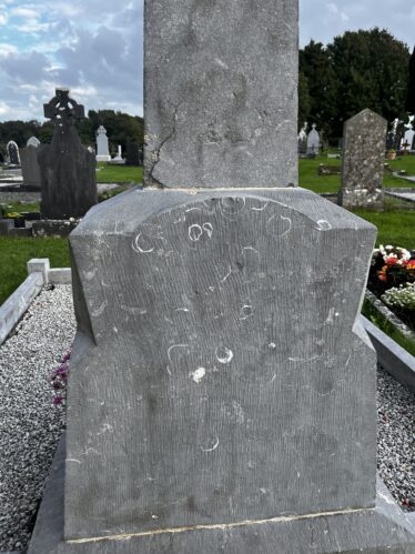 Brachipods Visible on a Celtic Cross in Maigh Cuilinn Graveyard