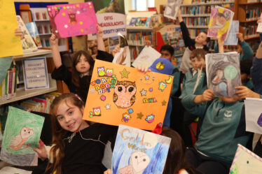 Children show off their Owl Pictures
