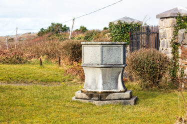 Baptismal font in the grounds of the Errislannan Church of Ireland church | Roger Harrison