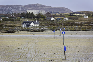 The Omey Strand crossing to Claddaghduff from Sturrakeen at low tide  | Roger Harrison