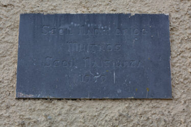 The plaque on the wall of the old Moyrus National School | Roger Harrison