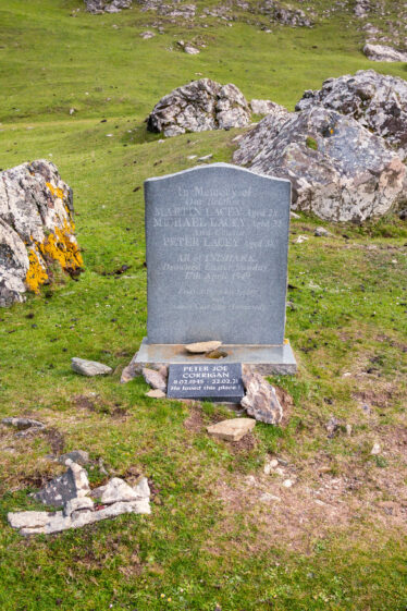 Memorial to drowned residents of Inishshark. On the cliff above Trá Gheal Beach facing Inishark.  Lat/long: 53° 36.9770N, 10° 14.6407W. - What3Words: ///twitch.speechless.leaky | Roger Harrison
