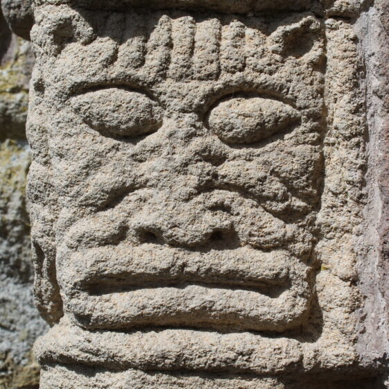 Ornate cat mask carved in sandstone  | Christy Cunniffe