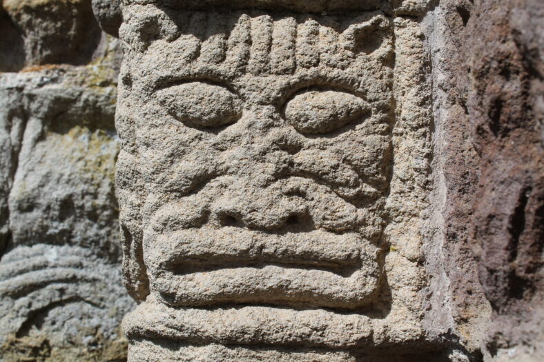 Ornate cat mask carved in sandstone  | Christy Cunniffe