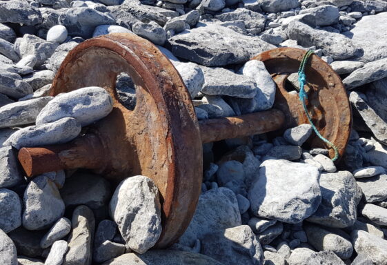 Two of the wheels of a railway tank which came ashore during WW2