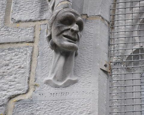 Cartoon-like carved heads