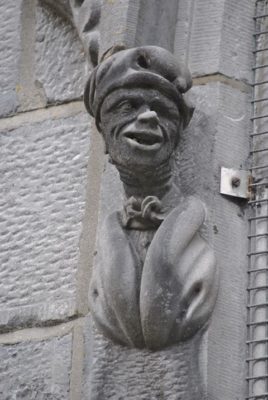 Cartoon-like carved heads