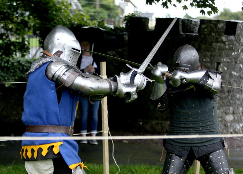 Members of Medieval Armed Combat Team demonstrating the Medieval sword fighting at the Athenry Walled Towns Day, Co. Galway.
 | Photo: Hany Marzouk