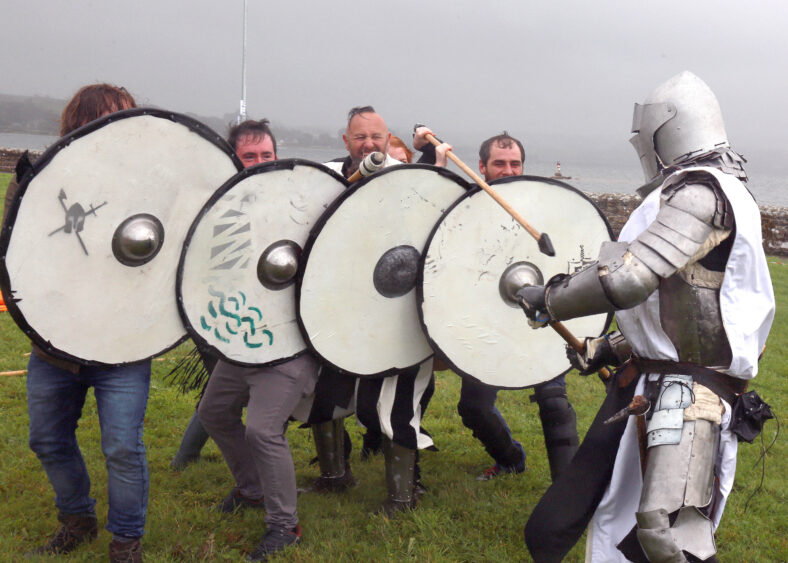 Haxx Comorford taking on the vikings fights at the Loughrea Medieval Festival.
