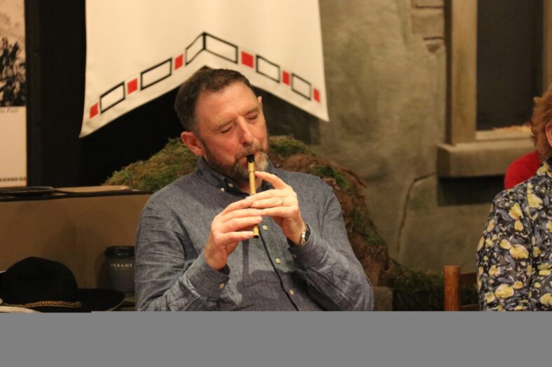 Playing the tin whistle