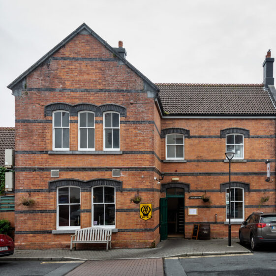 Front of the old station, now the signal bar and restaurant.
Lat / Long: 53° 29' 18.24'' N, 10° 1' 4.8'' W.
What3Words: ///teams.motor.regulate.
Eircode: H71 PX68
