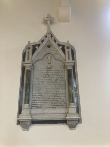 Memorial Tablet above the resting place of Canon Heaney in Caherlistrane Church | Photo: Liam Burke