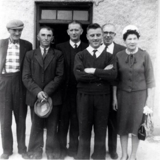 Mellody's Shop L-R Mick Conneely Thomas Jordan Frank Reynolds Harry Mellody Peter Reynolds Delia Reynolds (nee Conneely)