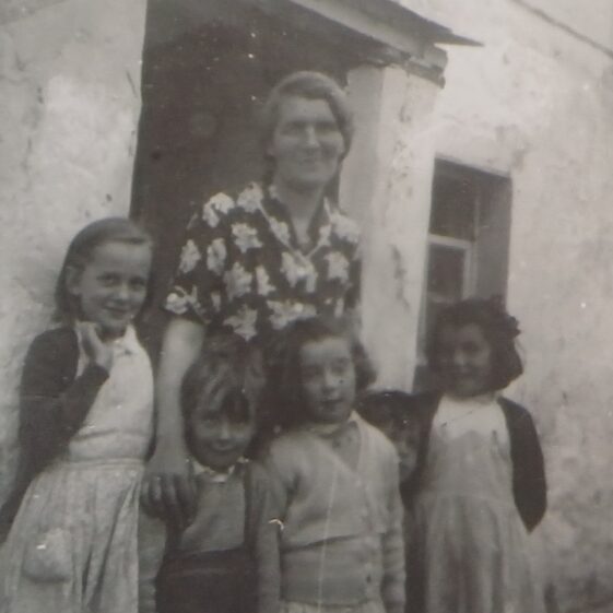 Midwife Catherine Mathot Mary Ina Tom Seán and Mathilda at their old house Main St Duleek Co. Meath (where Spar shop is now)